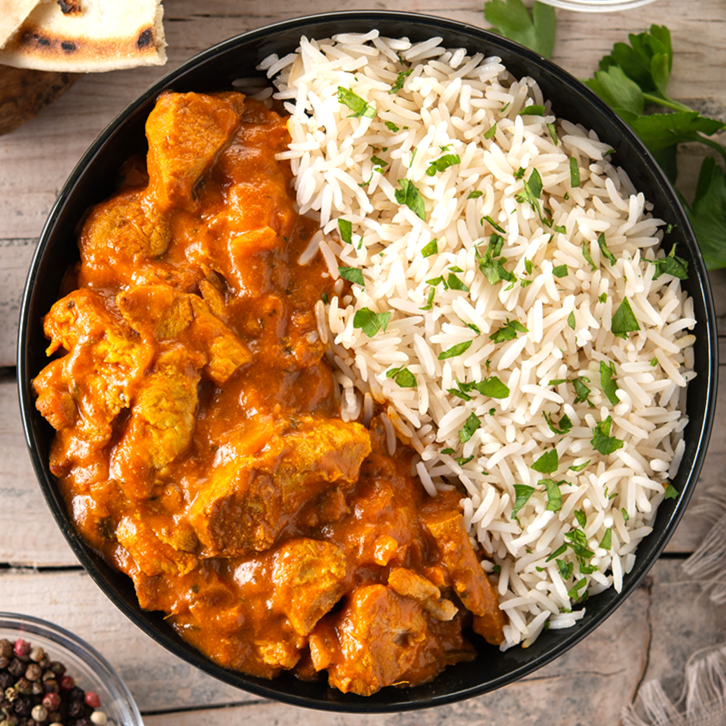 Arroz con pollo tikka masala