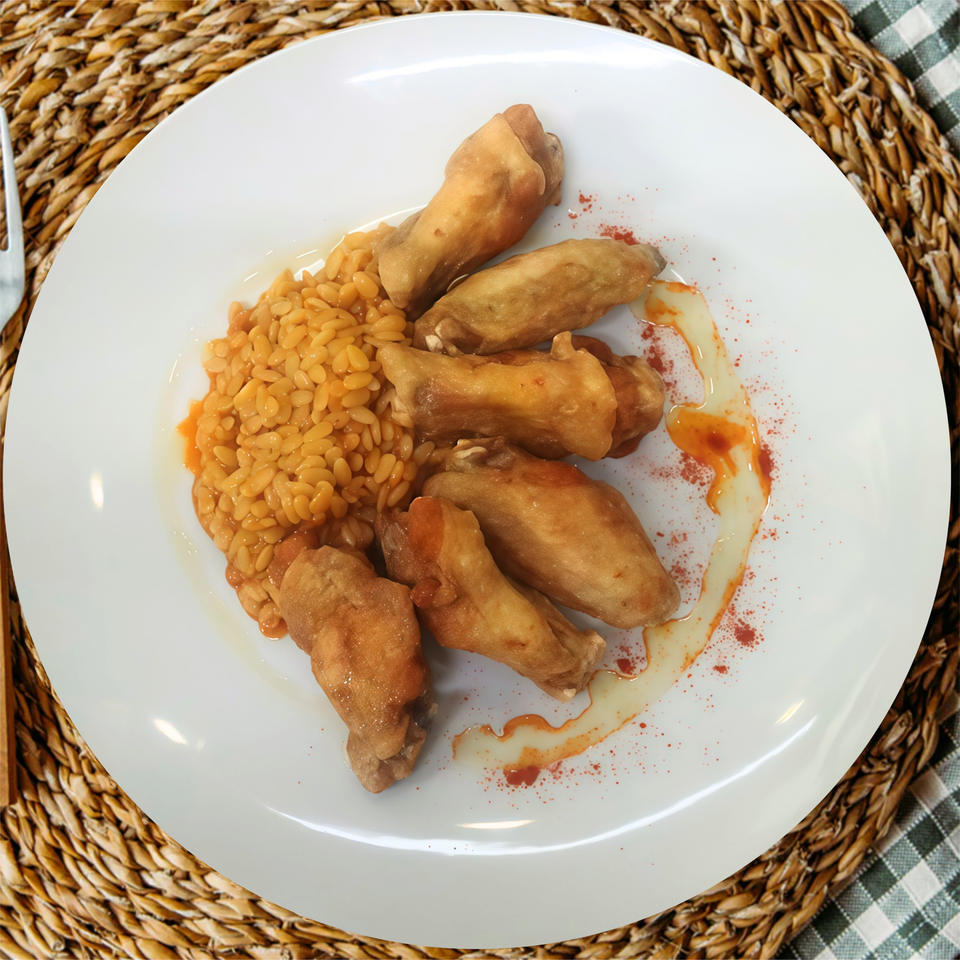 Alitas de pollo con falso risotto con almogrote