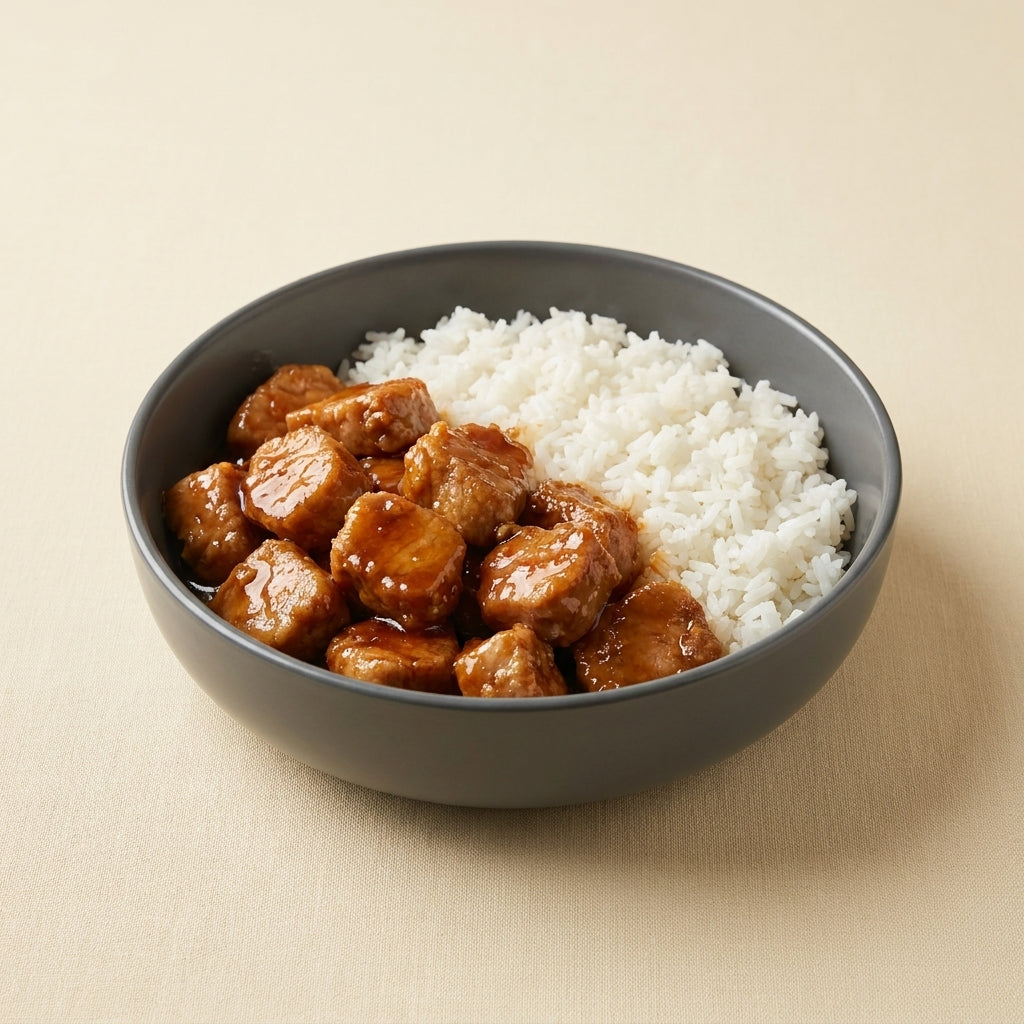 Cerdo en salsa agridulce con arroz blanco