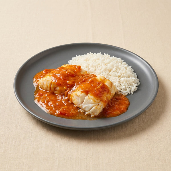 Rape en salsa americana con arroz
