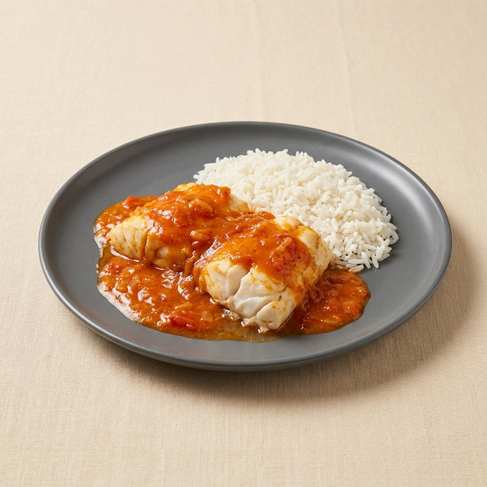 Rape en salsa americana con arroz