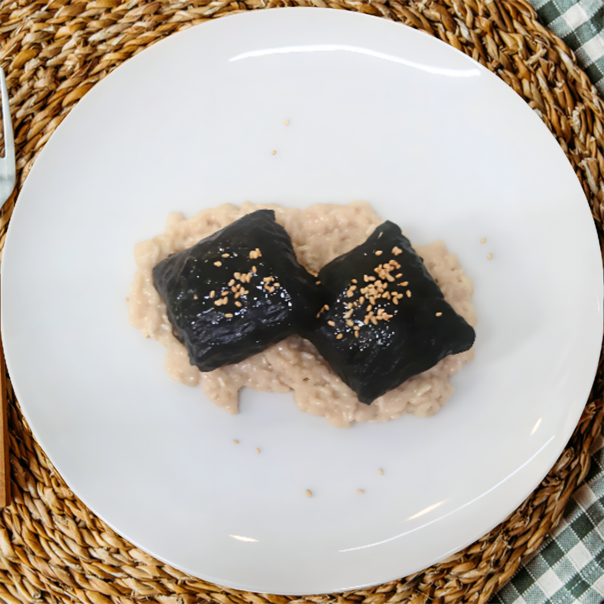 Merluza en papillote de alga nori con risotto de coco