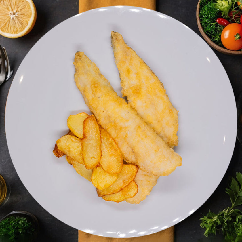 Merluza rebozada con patatas fritas