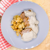Solomillo de cerdo a la pimienta con patatas